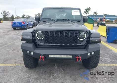 2024 Jeep Wrangler 4-Door Willys 4X4 from USA, damaged, VIN 1C4PJXDG4RW218996